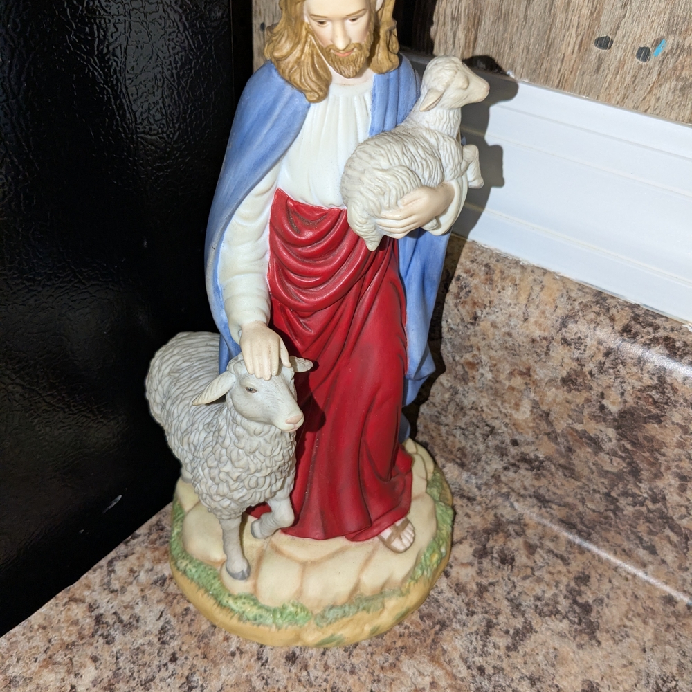 Religious Figurine with Red and Blue Robe